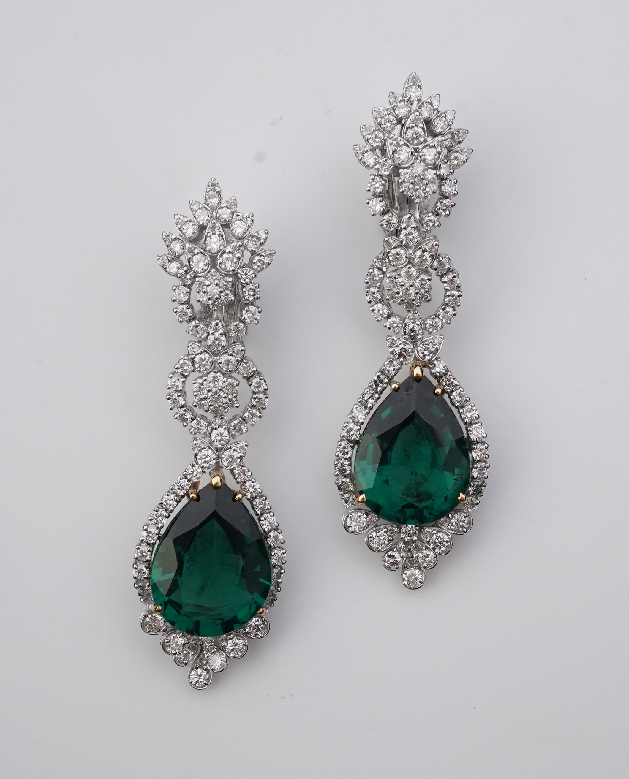 A pair of synthetic green quartz and diamond earrings